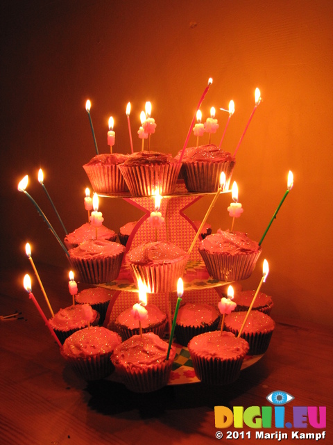 SX17137 Jen's cupcake birthday cakes with candles lit